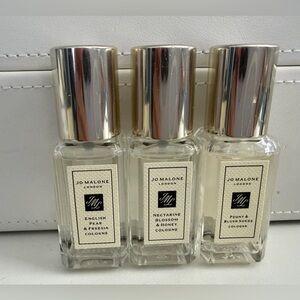 Jo Malone 3 mini 0.3 ounce bottles of cologne.  Full.  New.